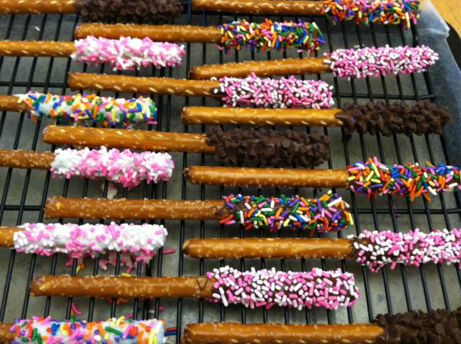 Organize your kitchen with the art of Mise en Place plus a recipe for Chocolate and sprinkle covered pretzel rods for Valentine's Day. Easy to make with your kids! organizedartistry.com
