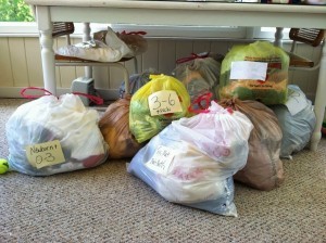 Tales of a Town-Wide Garage Sale - A perfect way to purge before a home renovation I organizedartistry.com #organizegaragesale